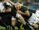 South Africa's Schalk Burger lends his weight to a drive