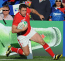Wales winger Shane Williams scoots in at the corner
