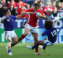 Wales centre Jamie Roberts storms forward
