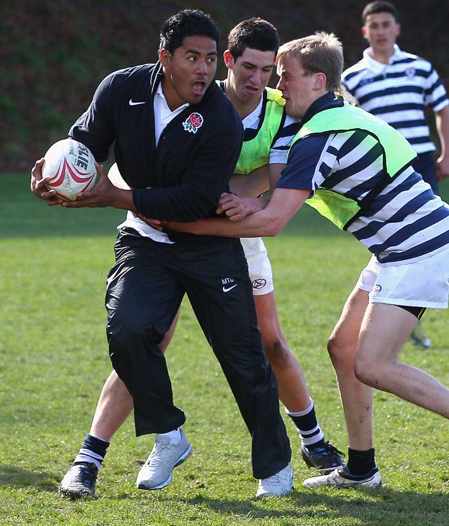 England's Manu Tuilagi takes part in a coaching visit to Otago Boys High School