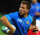 Italy's  Tommaso Benvenuti flicks the ball to a team-mate