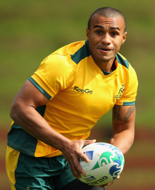 Australian scrum-half Will Genia runs the ball during a training session at Rugby League Park, Wellington, September 21, 2011