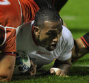 Tonga winger Fetu'umoana Vainikolo touches down for the try