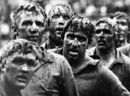 New Zealand Juniors caked in mud