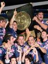 Stade Francais players celebrate with the 