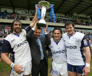 Sale's French contingent celebrates with the 2005 European Challenge Cup following their win over Pau at the Kassam Stadium, May 21 2005