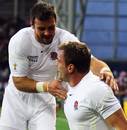 England's Mark Cueto is congratulated on his first try of the World Cup