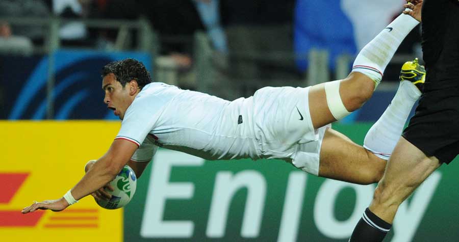 France's Maxime Mermoz crosses for their opening score of the match