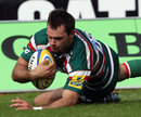 Leicester Tigers winger Niall Morris slides in to score