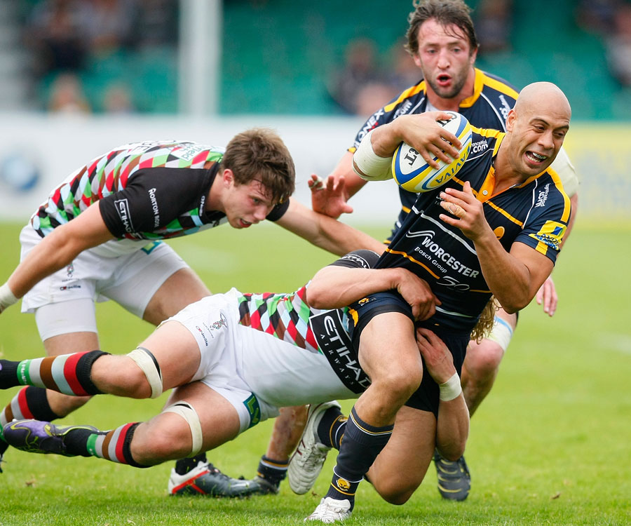 Worcester's Dale Rasmussen is cut down by the Harlequins defence