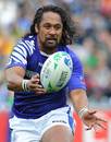 Samoa's Seilala Mapusua looks to shift the ball