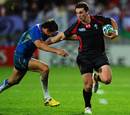 Wales' George North fights to reach the try line