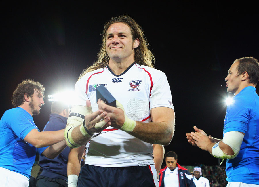 Todd Clever leads his US Eagles side off the pitch