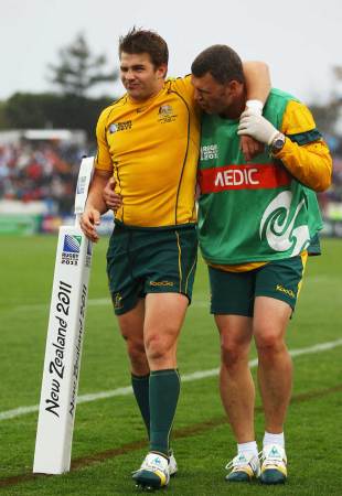 Australia's Drew Mitchell leaves the field with what looked to be a hamstring injury, Australia v Russia, Rugby World Cup, Trafalgar Park, Nelson, October 1, 2011