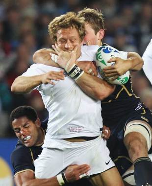 England's Jonny Wilkinson finds himself wrapped up by the Scottish defence, England v Scotland, Rugby World Cup, Eden Park, Auckland, New Zealand, October 1, 2011