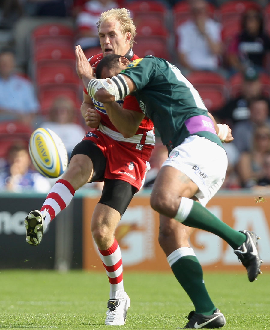 Gloucester's Olly Morgan is tackled by London Irish's Chris Hala'ufia
