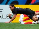New Zealand winger Israel Dagg crosses for his first score of the match