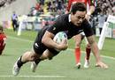 New Zealand winger Zac Guildford crosses for his hat-trick try