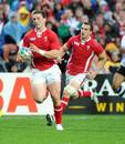 Wales' George North sprints away for the third try of the match