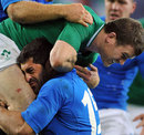 Ireland's Gordon D'Arcy runs into Italy's Andrea Masi