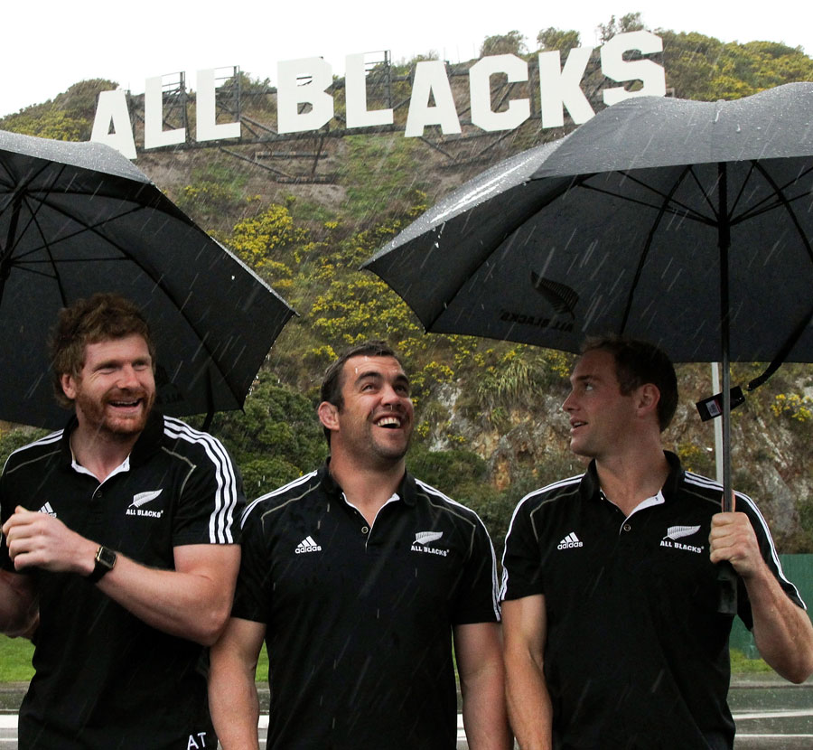Adam Thomson, Corey Flynn and Andy Ellis get ready to leave rainy Wellington