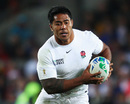 England centre Manu Tuilagi runs into space during the Pool B match against Scotland