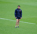 France's head coach Marc Lievremont stands in isolation during training