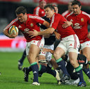 The Lions' Jamie Roberts and Brian O'Driscoll power through the Sharks' defence