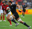 New Zealand's Jerome Kaino races in to score a try