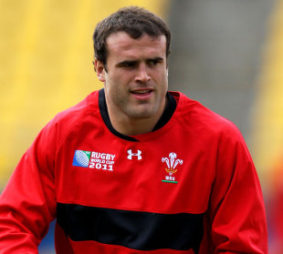 Wales centre Jamie Roberts passes the ball