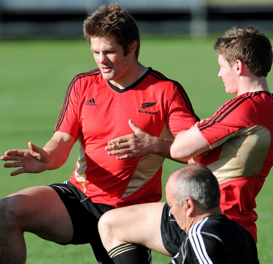 New Zealand's Richie McCaw passes on words of advice to Colin Slade ahead of Saturday's clash with Argentina