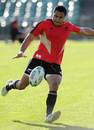 New Zealand fullback Mils Muliaina prepares to clear his lines during training