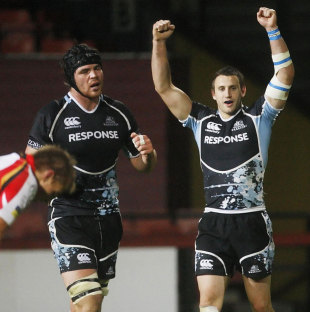 Glasgow Warriors's Tom Ryder with Tommy Seymour celebrate their 24-19 win against the Newport Gwent Dragons at Firhill, Glasgow, October 7, 2011