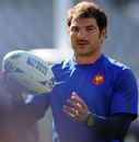 France's head coach Marc Lievremont juggles with a ball during a Captain's Run