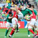 Ireland flanker Stephen Ferris is tackled