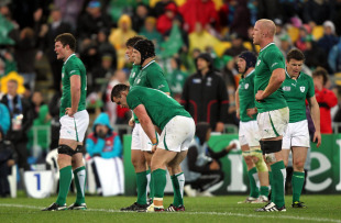 Ireland players stand dejected following their defeat, Ireland v Wales, Rugby World Cup quarter-final, Wellington Regional Stadium, Wellington, New Zealand, October 8, 2011