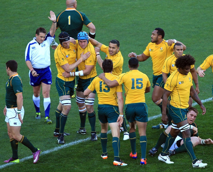 Australia players celebrate James Horwill's try
