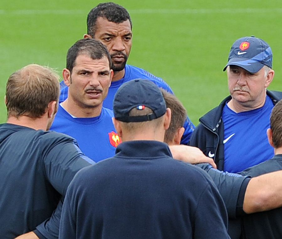 France's head coach Marc Lievremont gives to instructions to his players during training