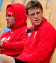 Injured Wales flyhalf Rhys Priestland looks on from the stands during training