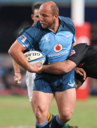 Blue Bulls Gary Botha is tackled during the Super Rugby match between Sharks and Bulls at Mr Price Kings Park, Durban, South Africa, May 21, 2011 