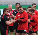 Wales centre Jamie Roberts and his team-mates enjoy a joke during training