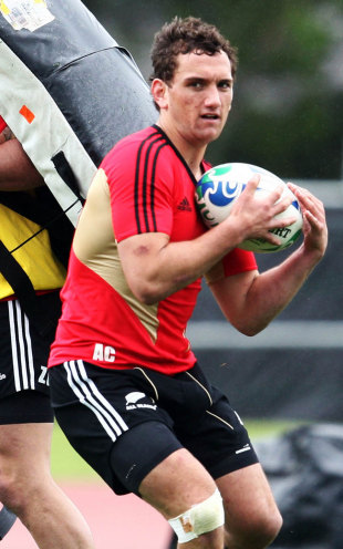 All Blacks fly-half Aaron Cruden claims the ball in training, New Zealand training session, Trusts Stadium, Auckland, New Zealand, October 12, 2011
