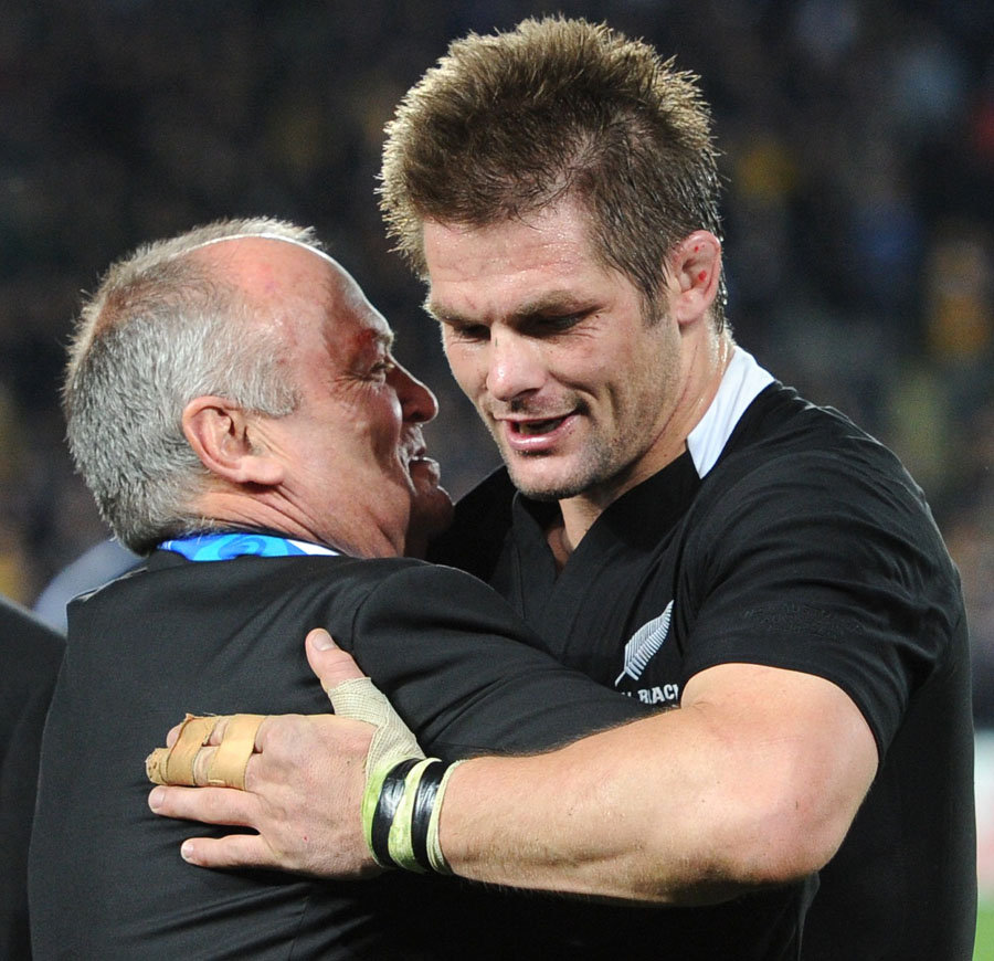 New Zealand's Richie McCaw hugs coach Graham Henry