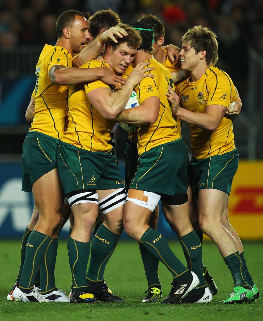 Australia celebrate Berrick Barnes' first-half try