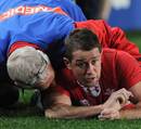 Wales' Shane Williams recovers from a huge hit