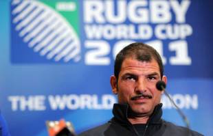 France coach Marc Lievremont smirks at a press conference, Auckland, New Zealand, October 22, 2011
