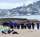 France's players take a stroll on Kohimarama beach