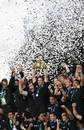 All Blacks skipper Richie McCaw hoists the World Cup aloft