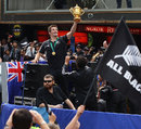All Blacks captain Richie McCaw shows off the Webb Ellis Cup