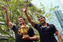 Richie McCaw and Mils Muliaina wave to supporters